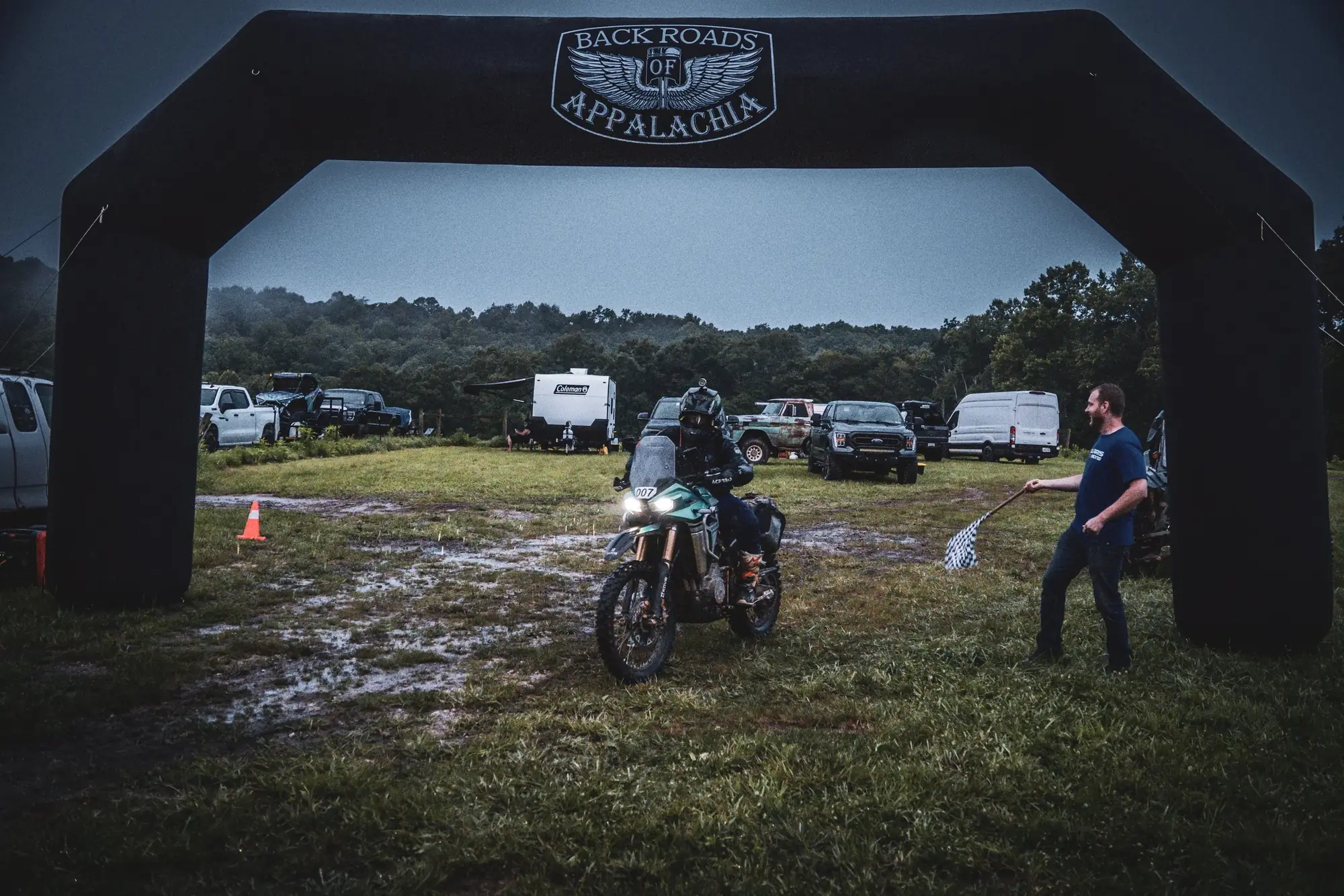 A rider arriving at the Backroads of Appalachia arch